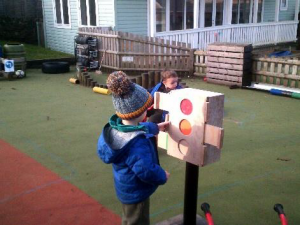 child looking at traffic lights