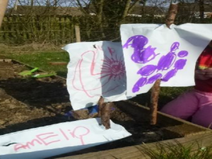 children's writing displayed outdoors