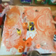 children finger painting