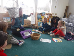 children sitting with adults