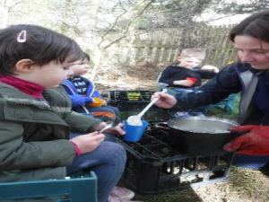 serving porridge at forest school