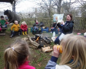 children listening to goldilocks by campfire